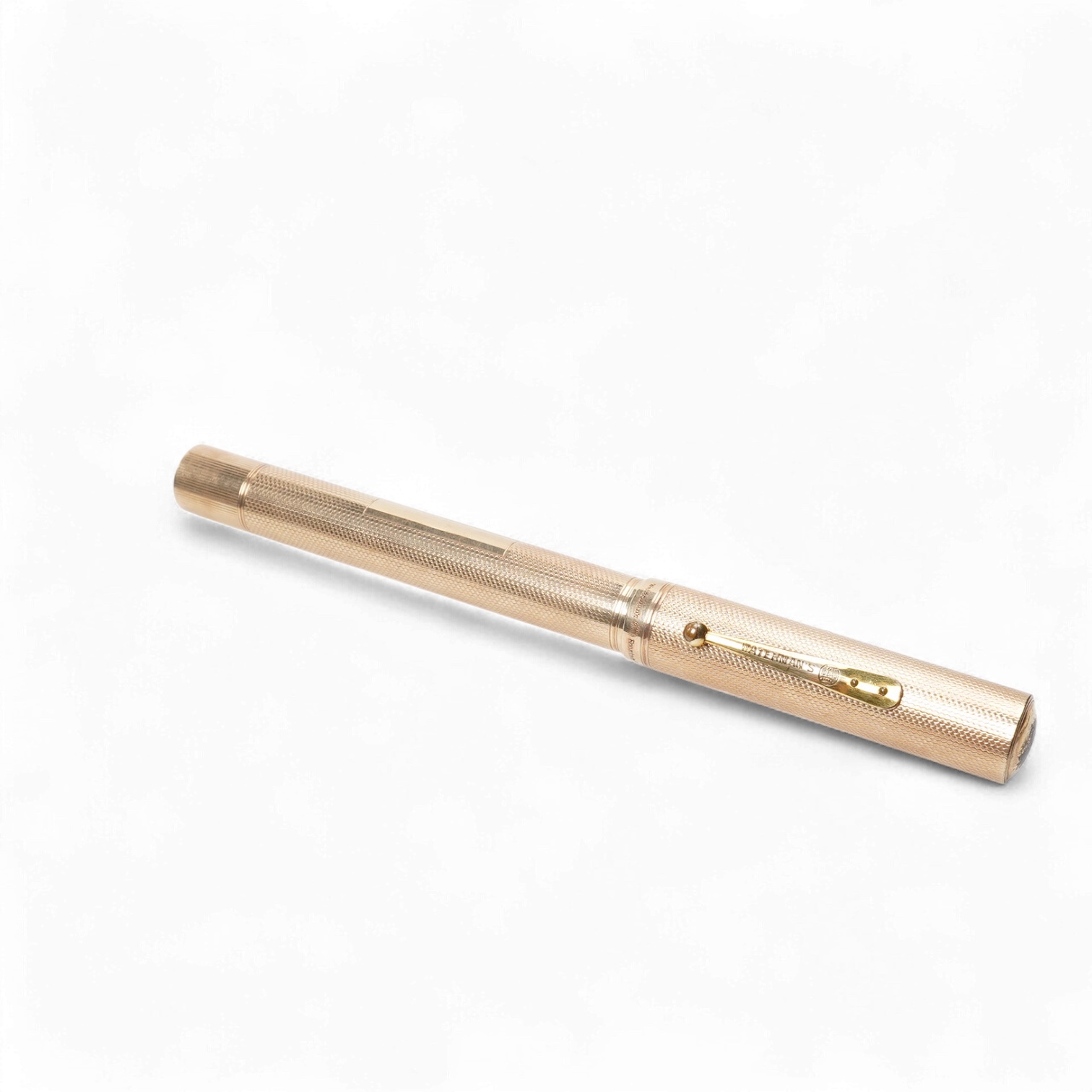 A large Waterman fully covered gold filled fountain pen, lever filler, in fine barley pattern - No.2 Waterman nib
